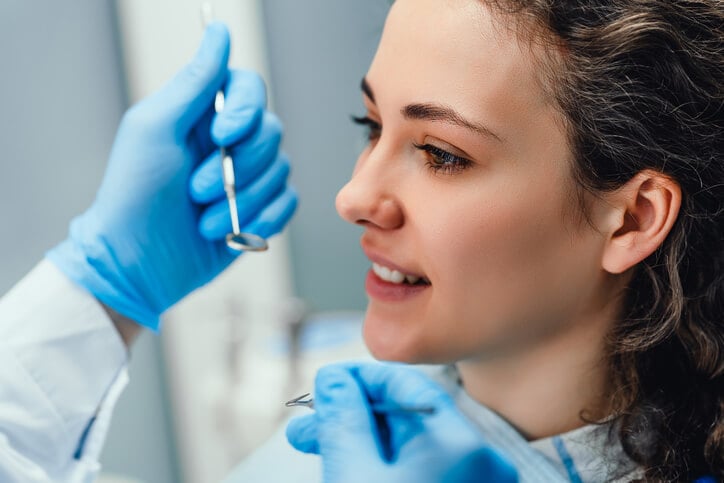 young woman getting a dental checkup