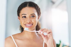 patient brushing their teeth